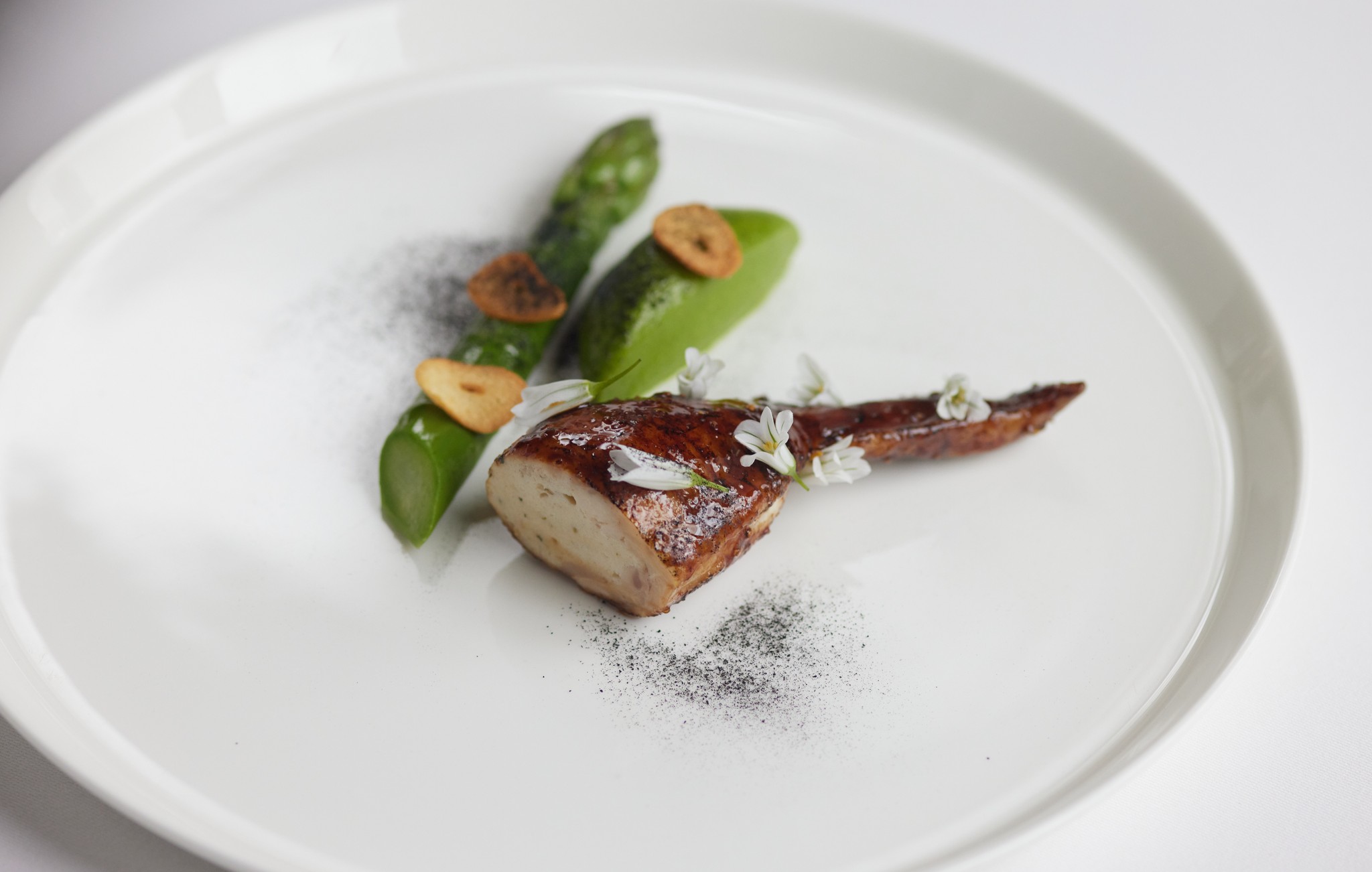 Cumbrian chicken wing with asparagus and wild garlic dish from Marcus Restaurant 