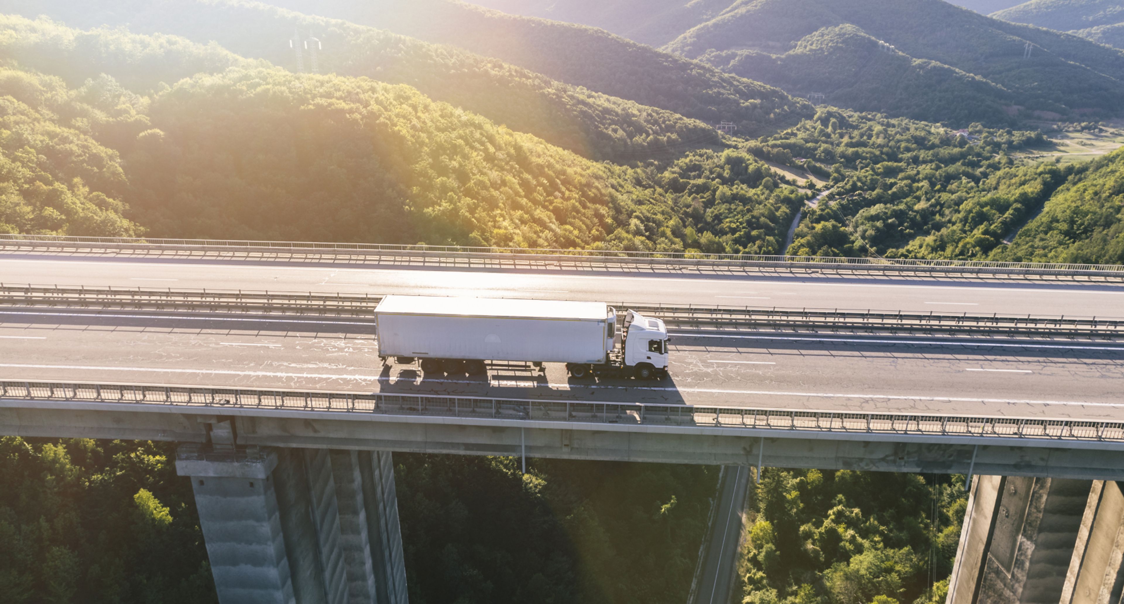 Truck driving over a bridge