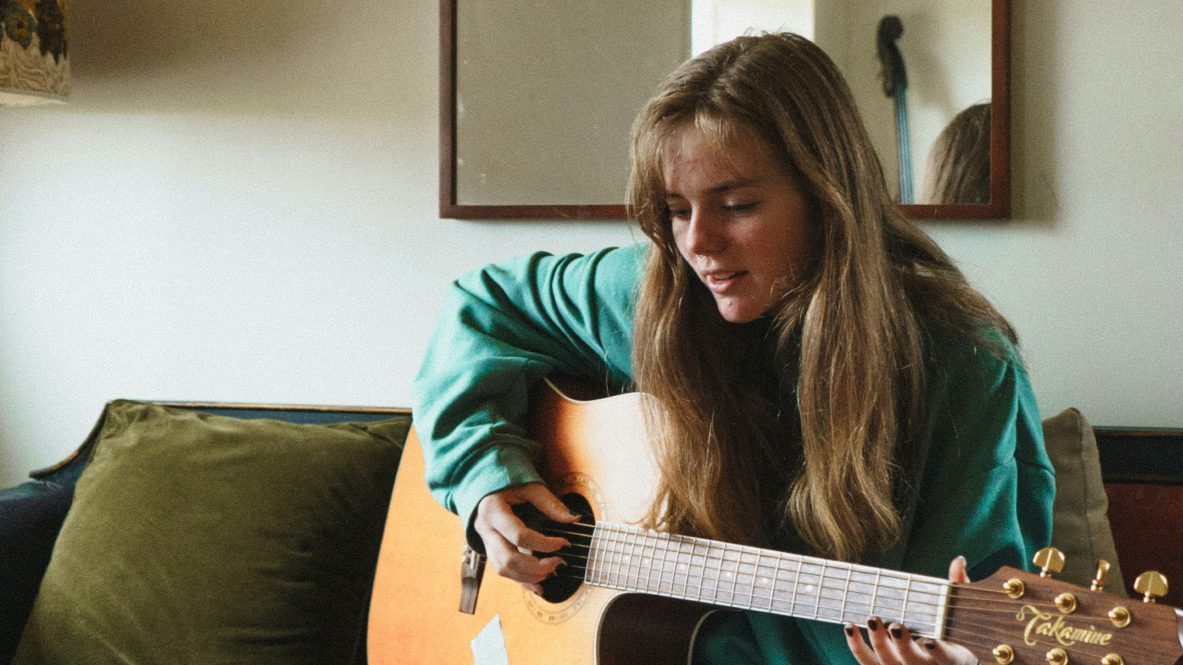 Girl playing guitar
