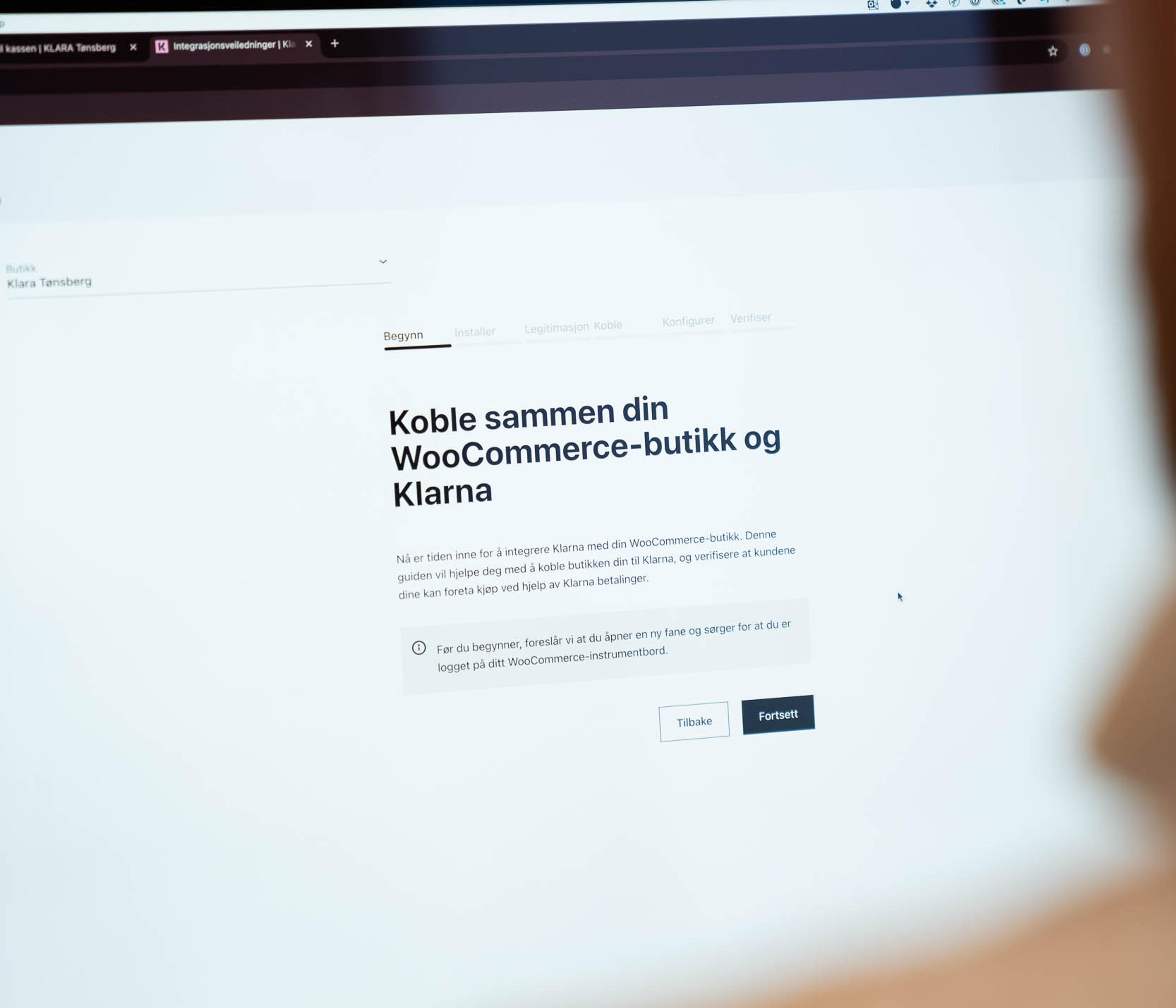 Skjermbilde av integrasjonside for WooCommerce-butikk og Klarna-betaling med to handlingsknapper.