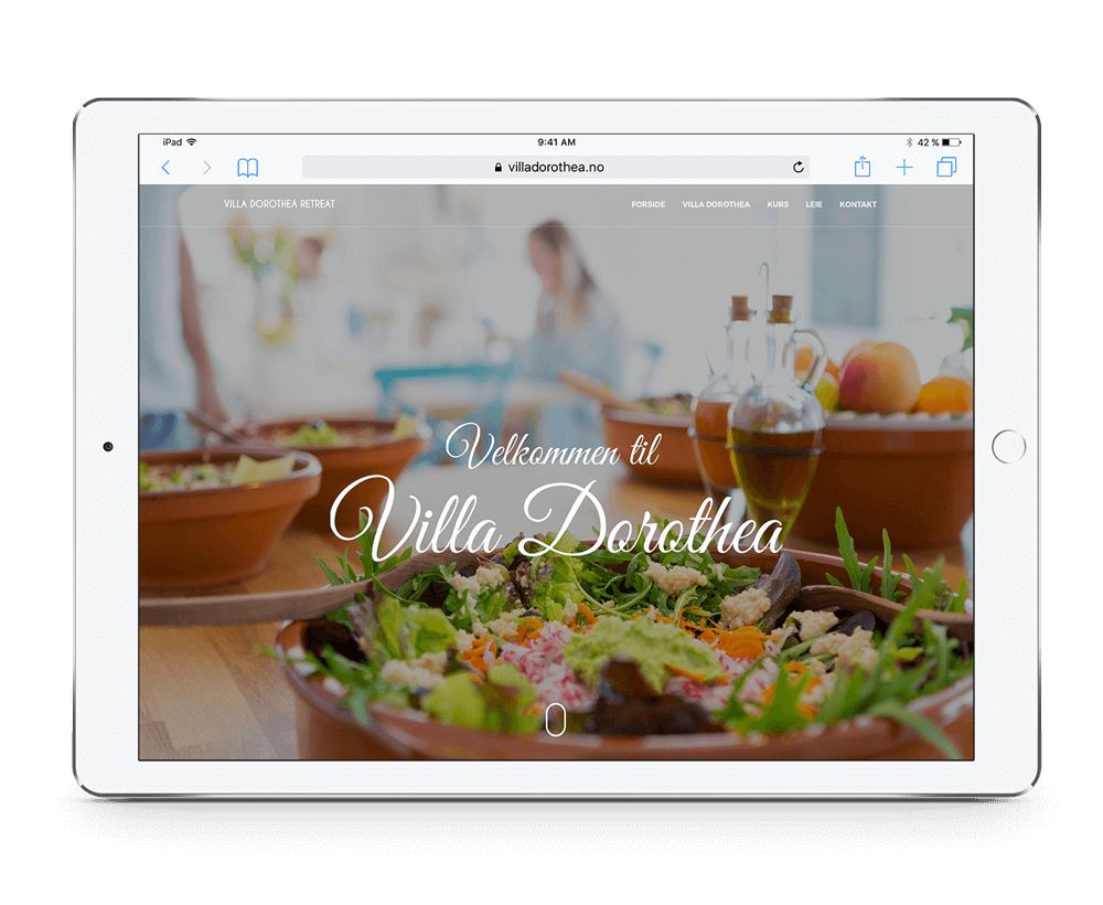Villa Dorothea nettside vist på iPad med responsivt design