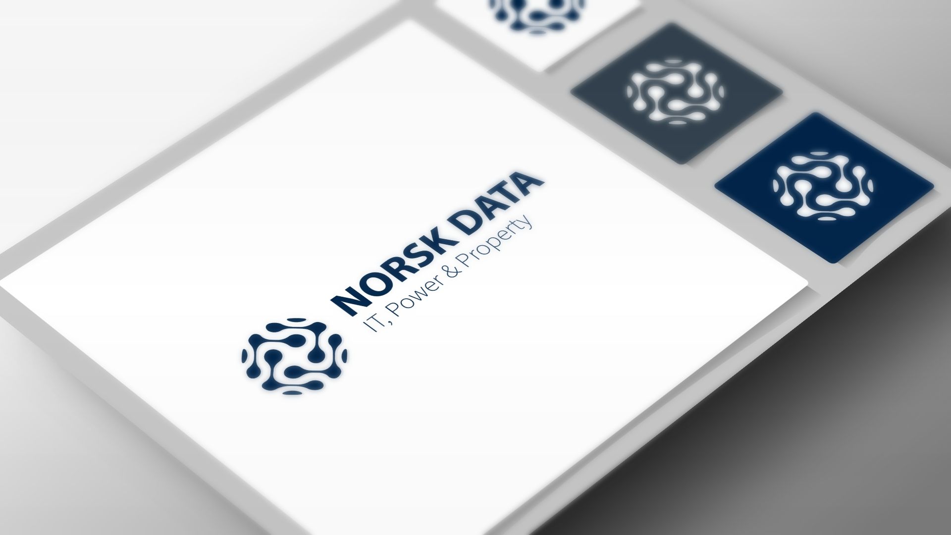 NORSK DATA IT Policy & Property logo med blått symbol og identitetselementer på hvit bakgrunn