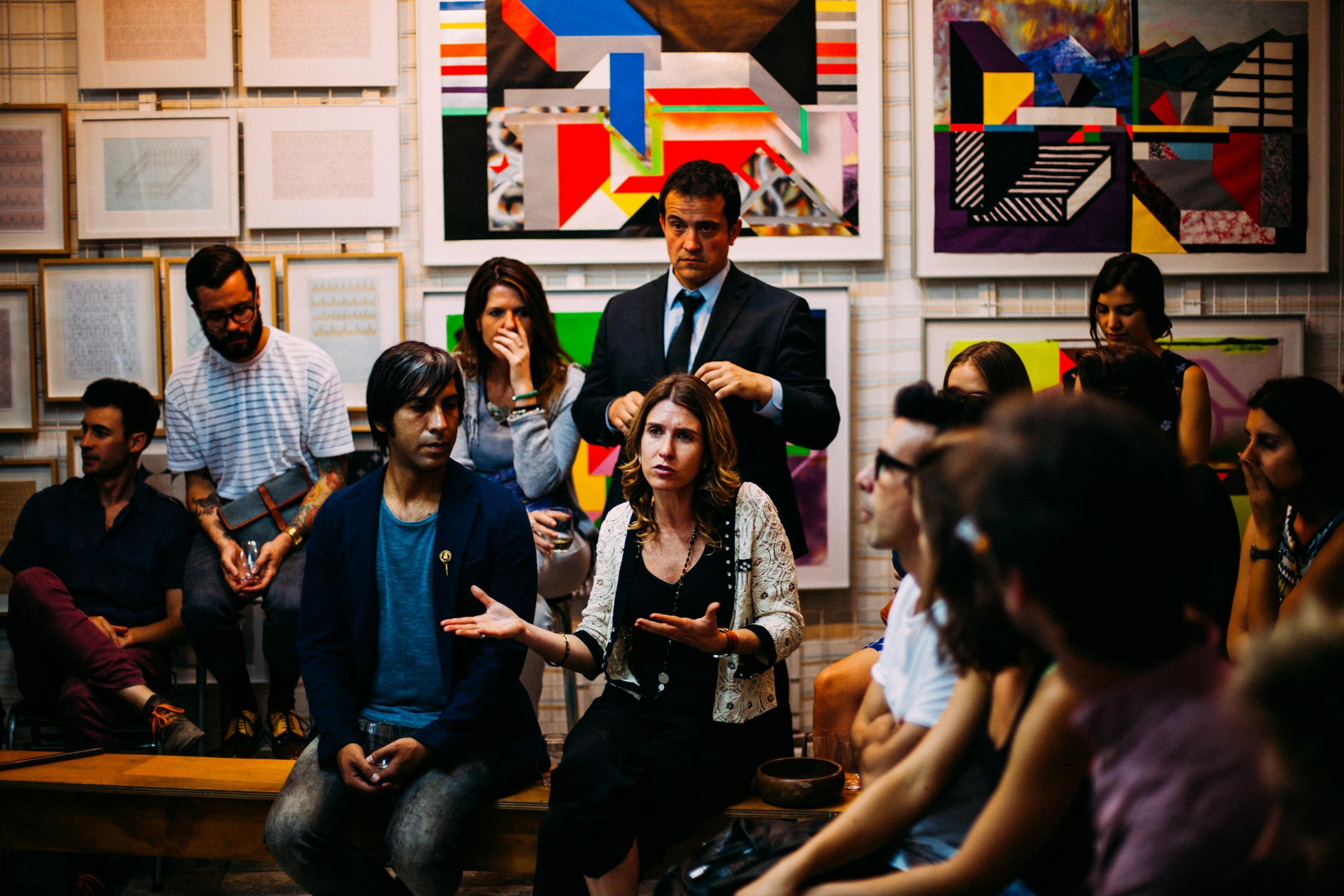 A group in discussion around a meeting table