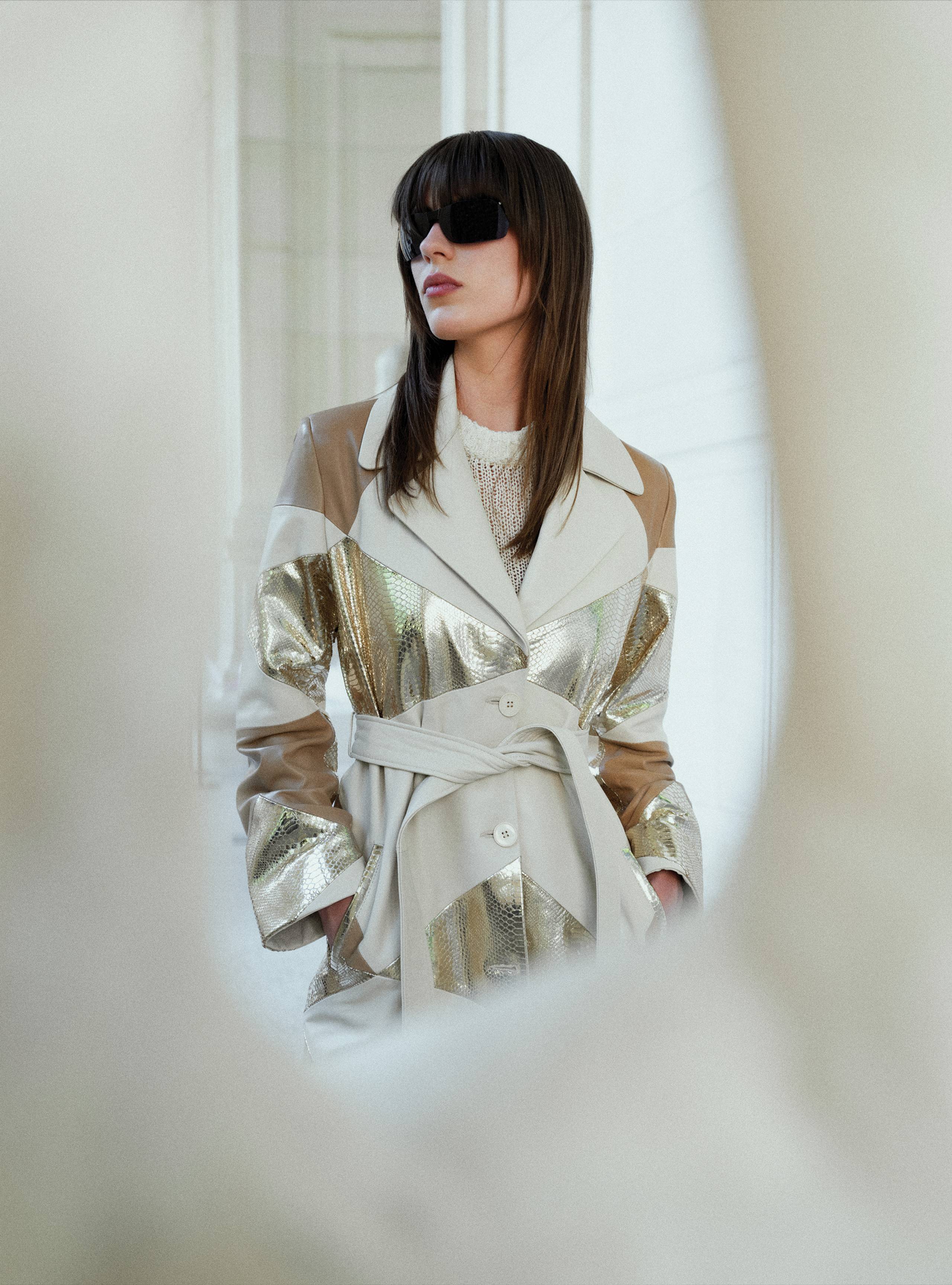 A model waring the Sonja Oak Liquid Gold Patchwork Leather Trench