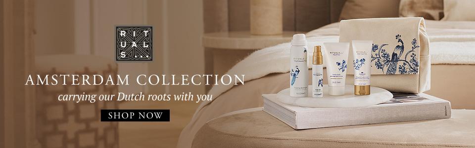 Rituals Amsterdam Collection banner featuring white and gold beauty products and a pouch with blue Dutch-inspired designs, with a "Shop Now" button.