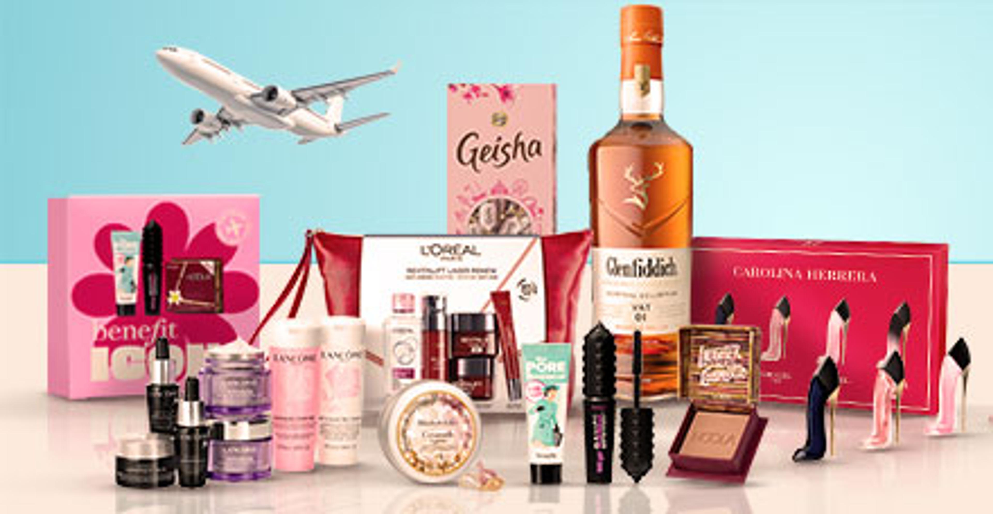 a bottle of glenfiddich whisky is surrounded by a variety of beauty products .