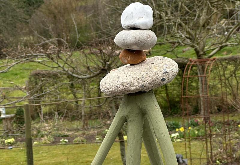 A sculpture made from recycled and natural materials