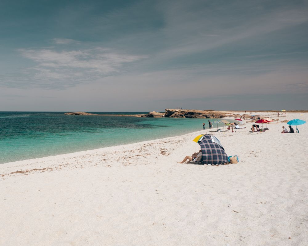 Plage d'Is Arutas en Sardaigne.