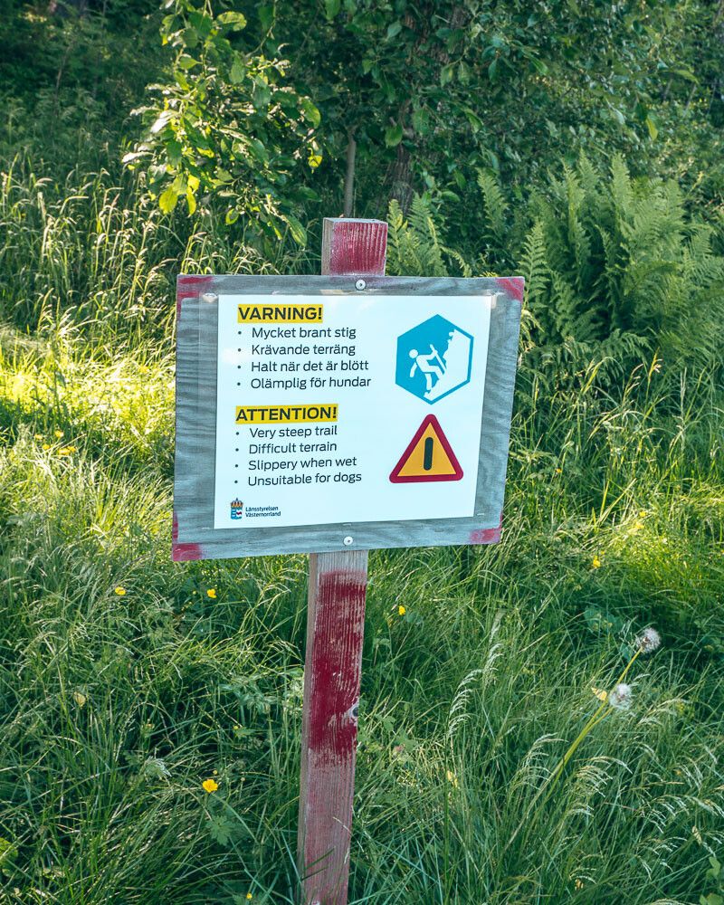 warning sign grottstigen
