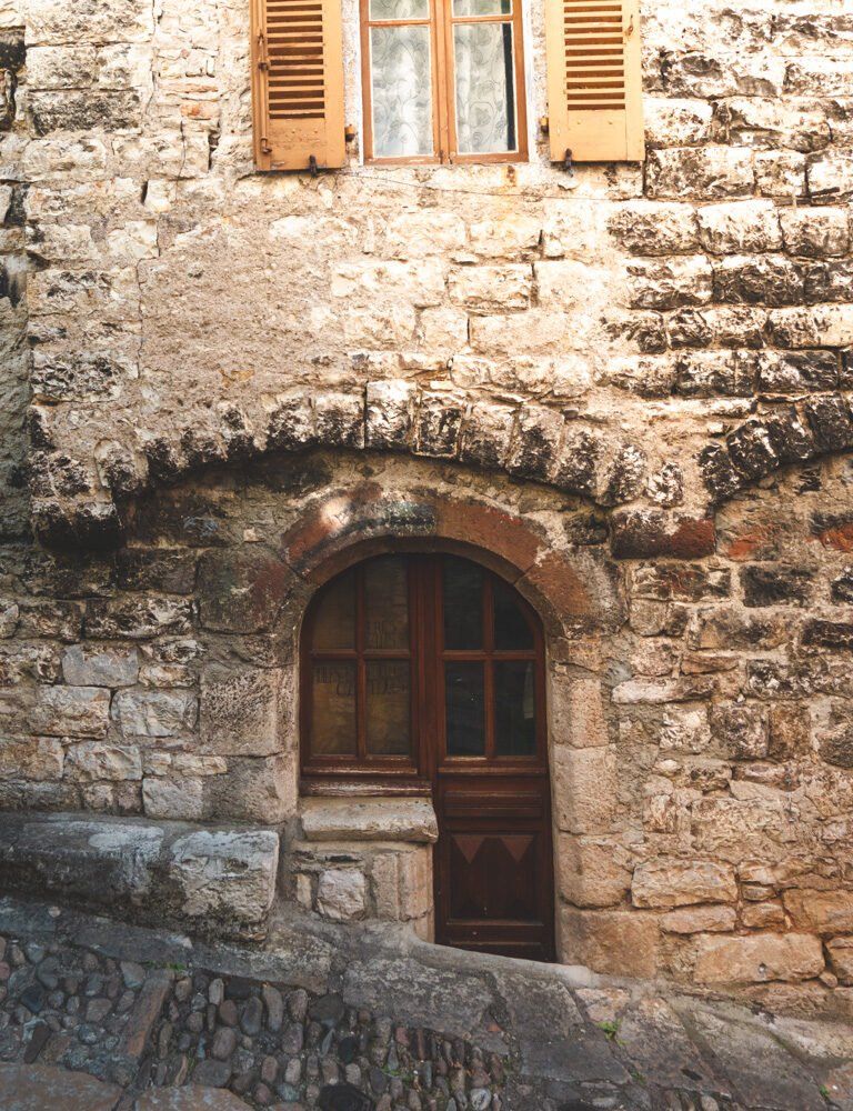 Steep street with house on it