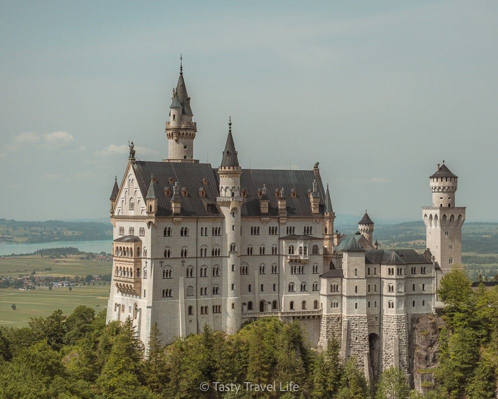 Neuschwanstein castle on hill from the marienbrucke, best viewpoint worth visiting Neuschwanstein castle  