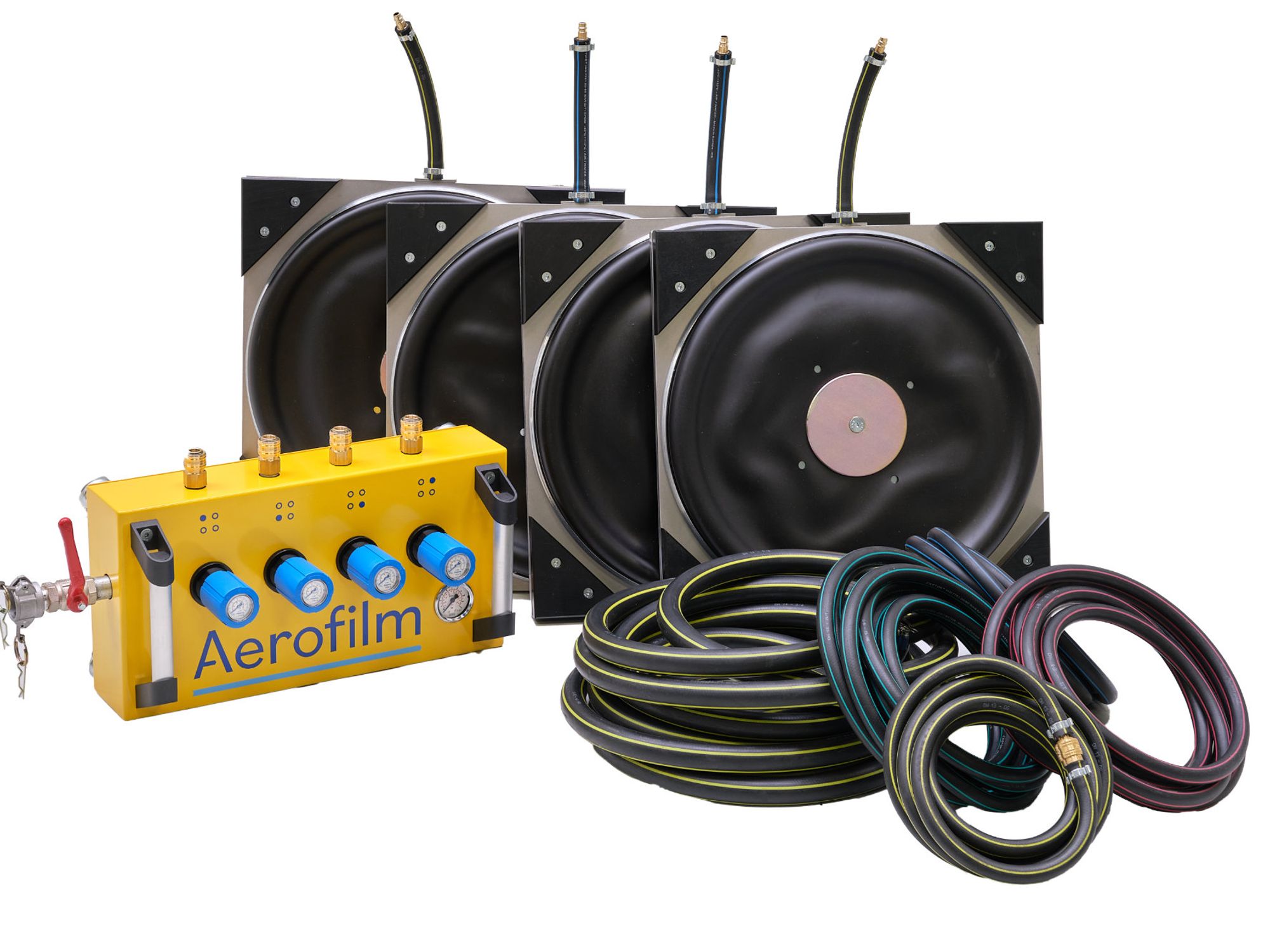 Load module system with four air casters, yellow control console and coiled hoses