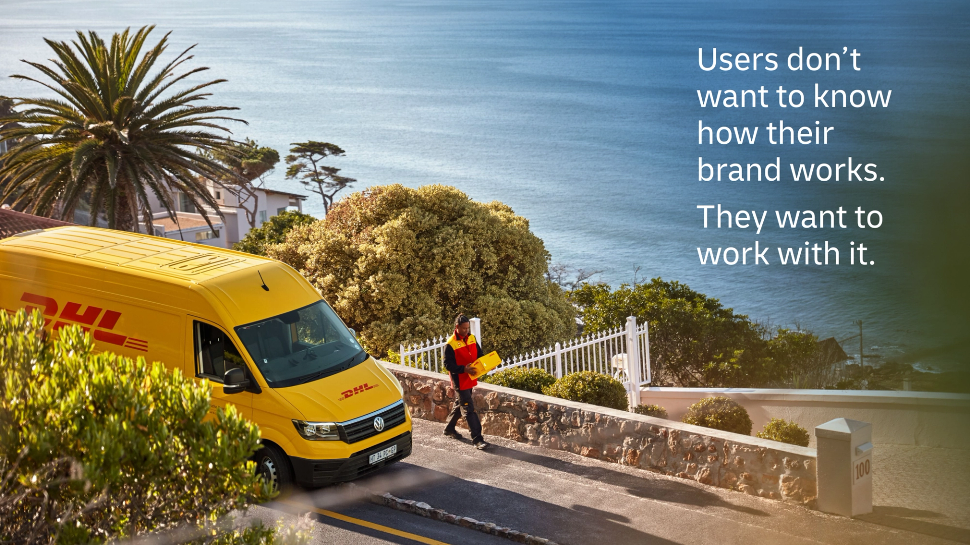 A yellow DHL delivery van is on a steep coastal road by the sea. A DHL delivery person walks on a sidewalk with a package. Text overlay: âUsers donÂŽt want to know how their brand works. They want to work with it.â.