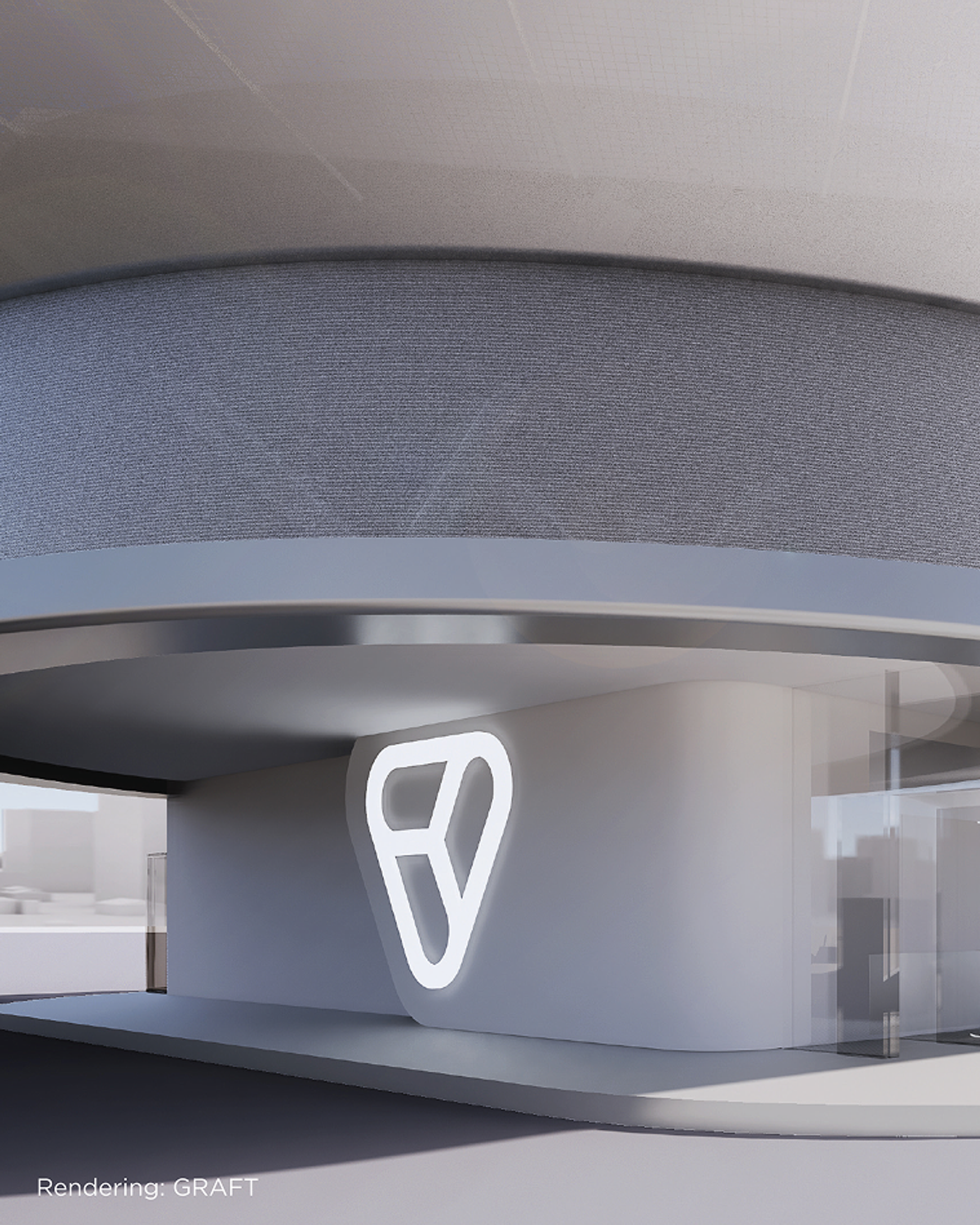 Rundbau mit beleuchtetem Volocopter-Logo an der Fassade