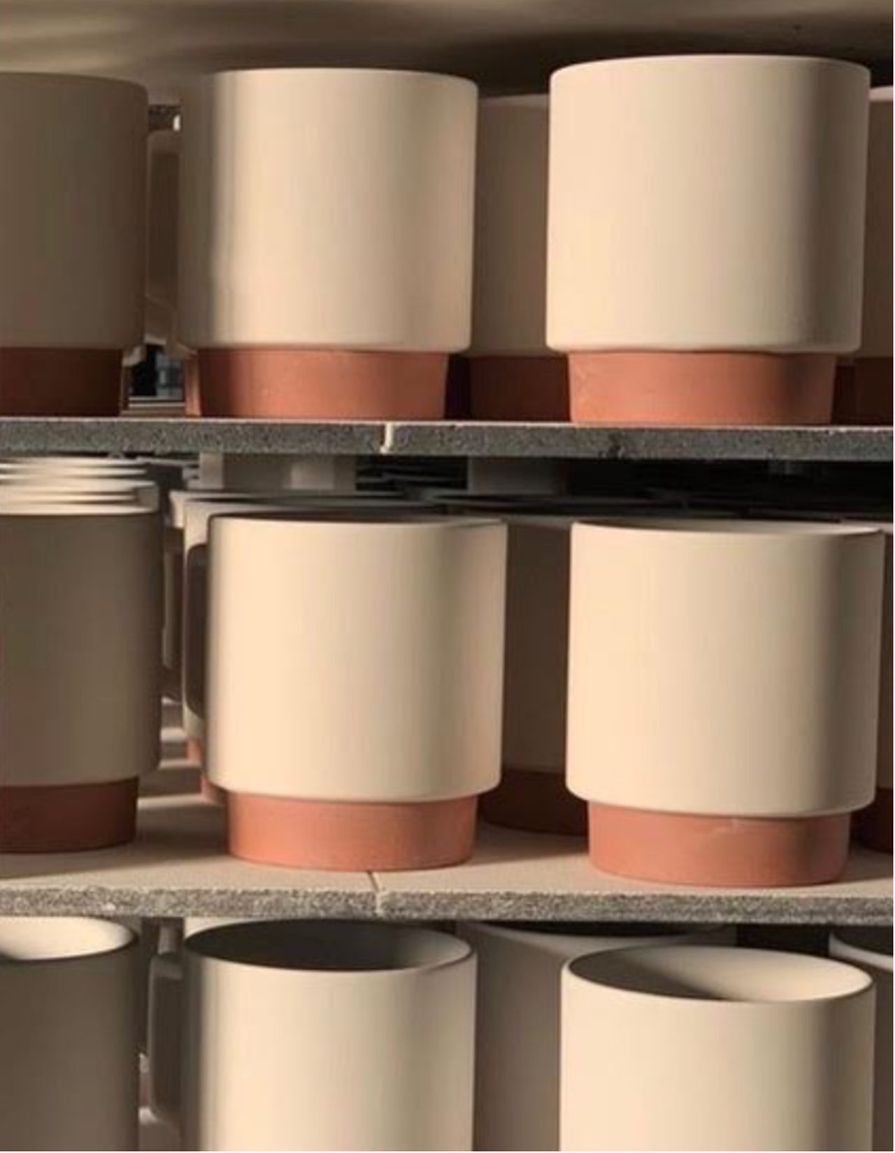 Ceramics aligned in a kiln, drying