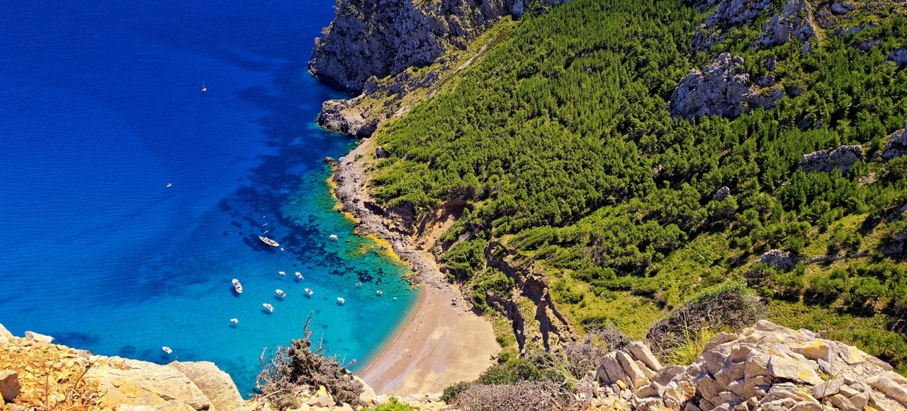 High Angle Shot of Boats on the Beach Bay, Cala Figuera