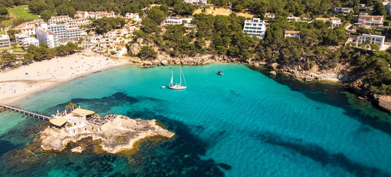 Picturesque view of the coastal village of Camp de Mar with turquoise sea, Mallorca island, Spain