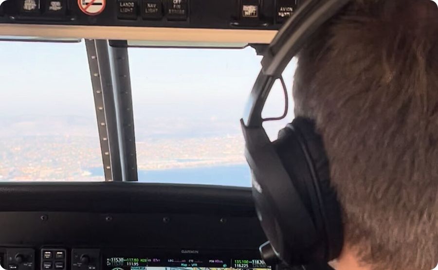 Cockpit view over the city during instrument training