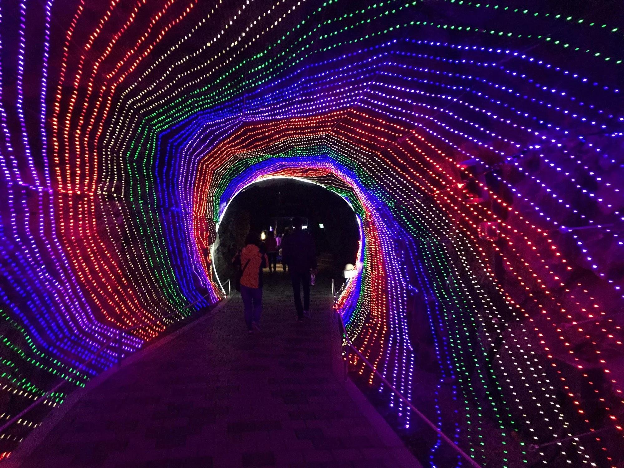 Rainbow light tunnel inside Gwangmyeong Cave, the best family friendly day trip from Seoul