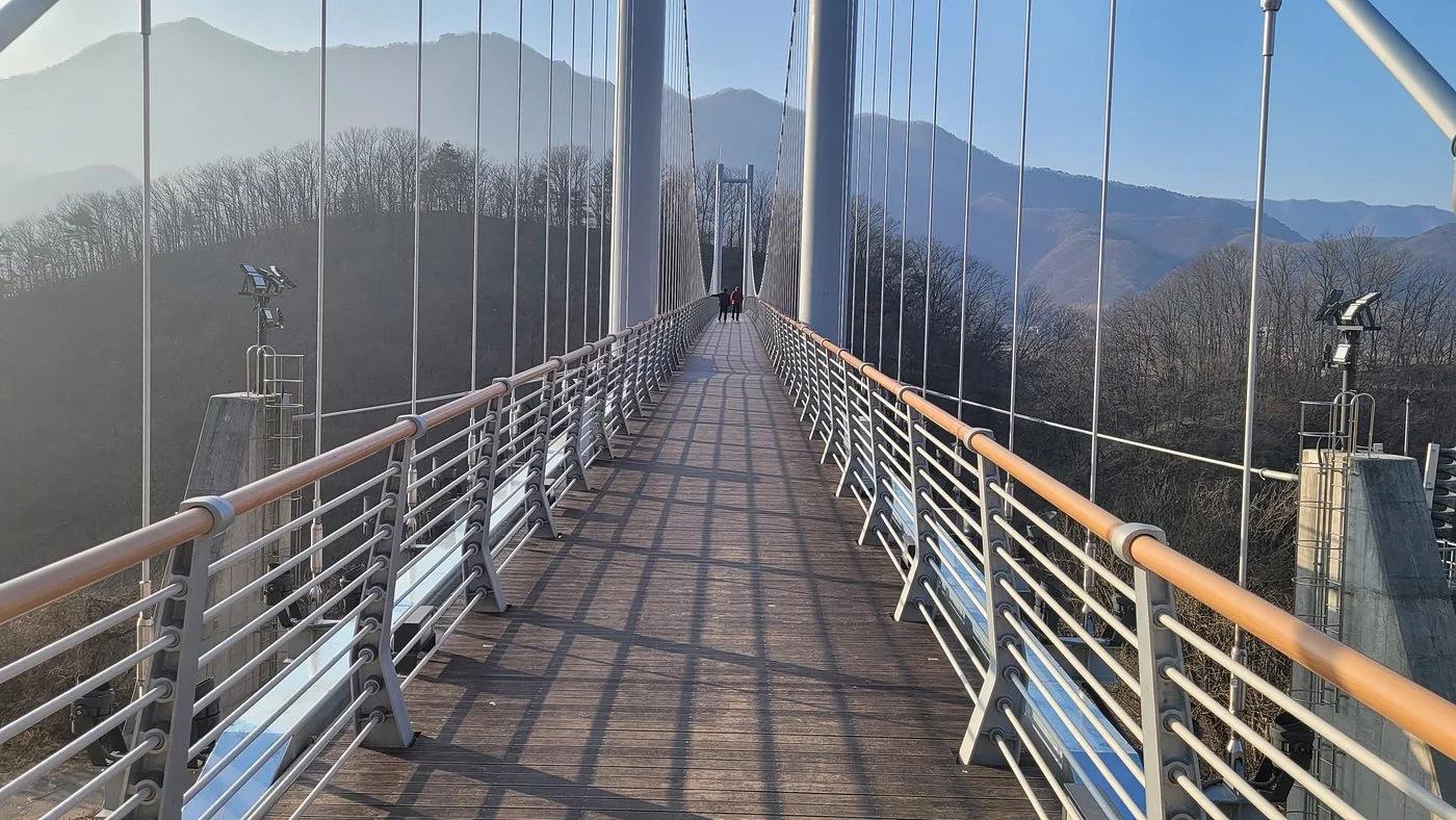 The Hantangang suspension bridge over the Hantan River as featured in 'Crash Landing on You' on a day trip from Seoul.