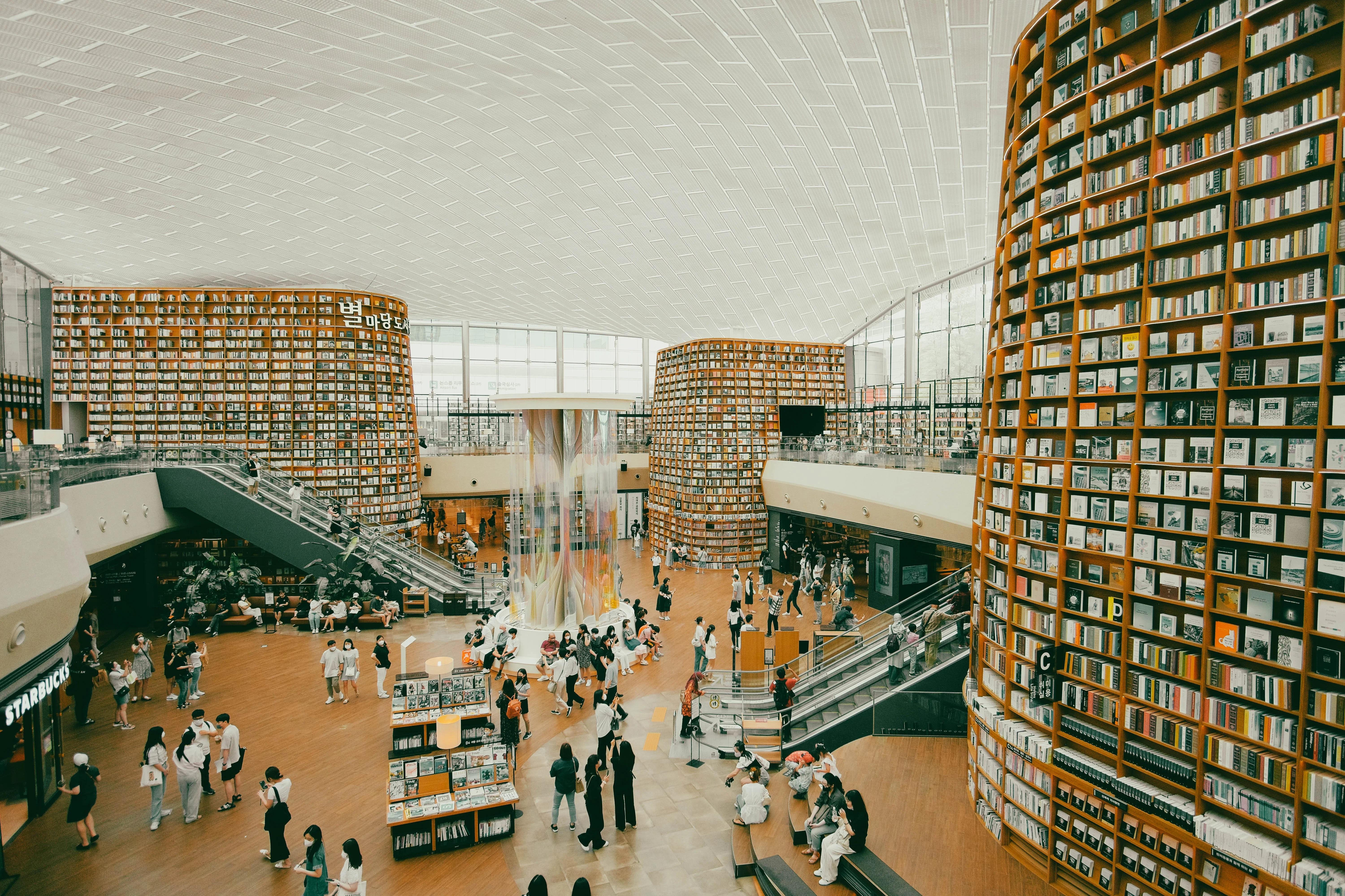 Starfield Library inside COEX Mall in Gangnam with towering floor-to-ceiling bookshelves and visitors browsing below