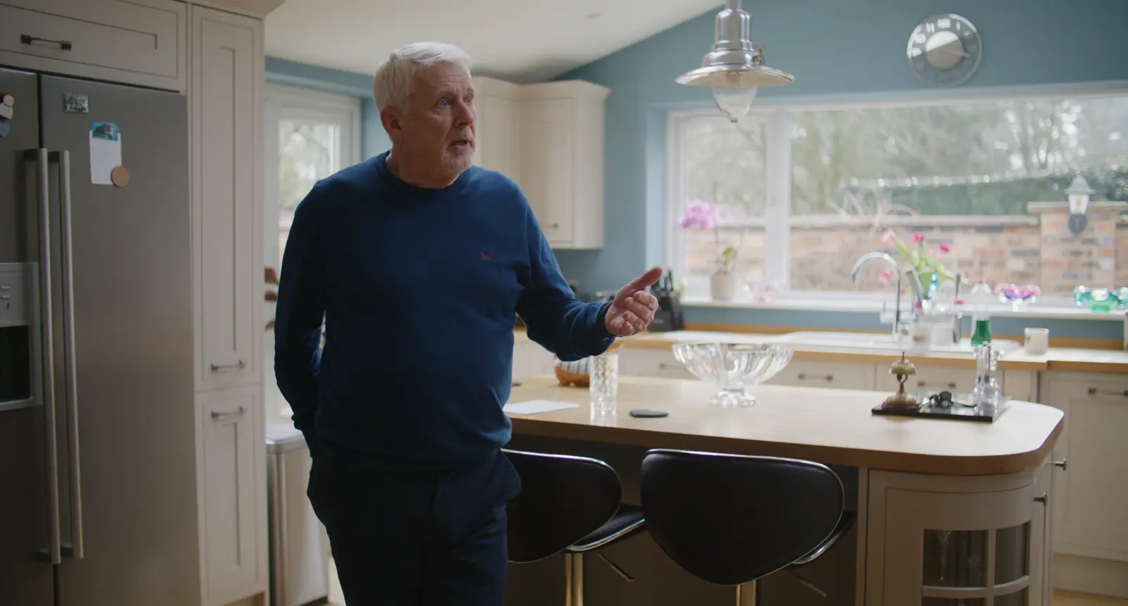 man in kitchen