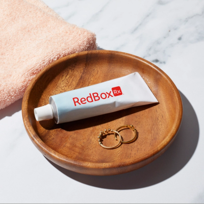 Tube of skin cream with RedBox Rx logo