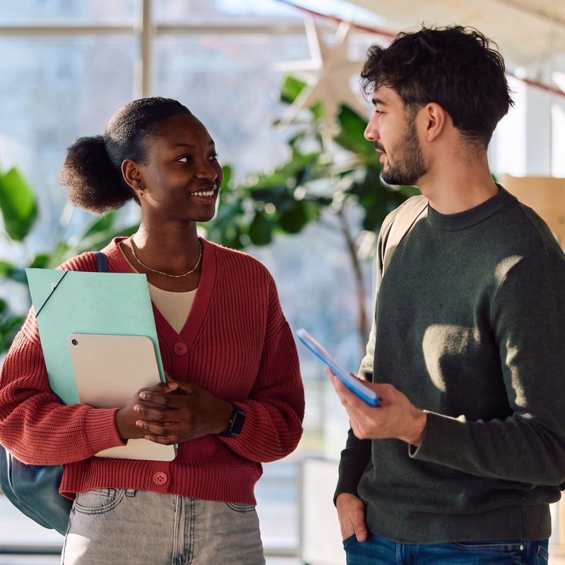 Female student and male student discussing with each other