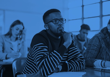 Young man sitting in a classroom