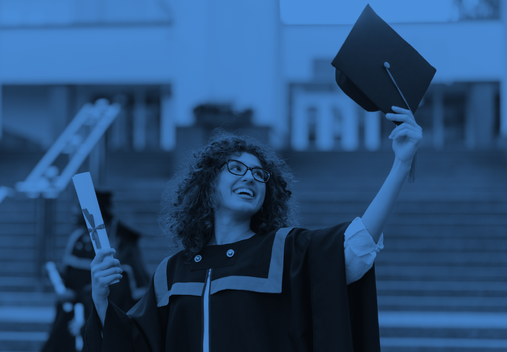 A young woman in graduation attire
