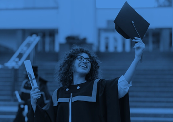 A young woman in graduation attire