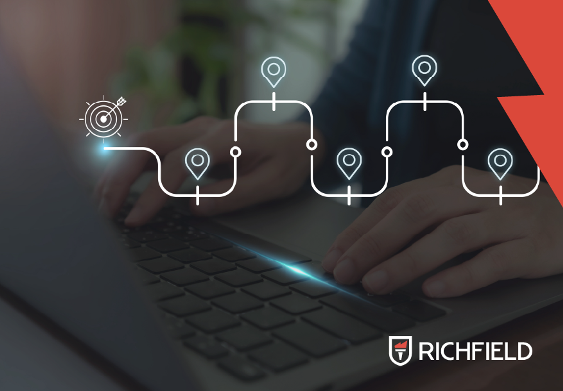 Working on a laptop with a dark grey overlay and an illustrated map drawn over the image.