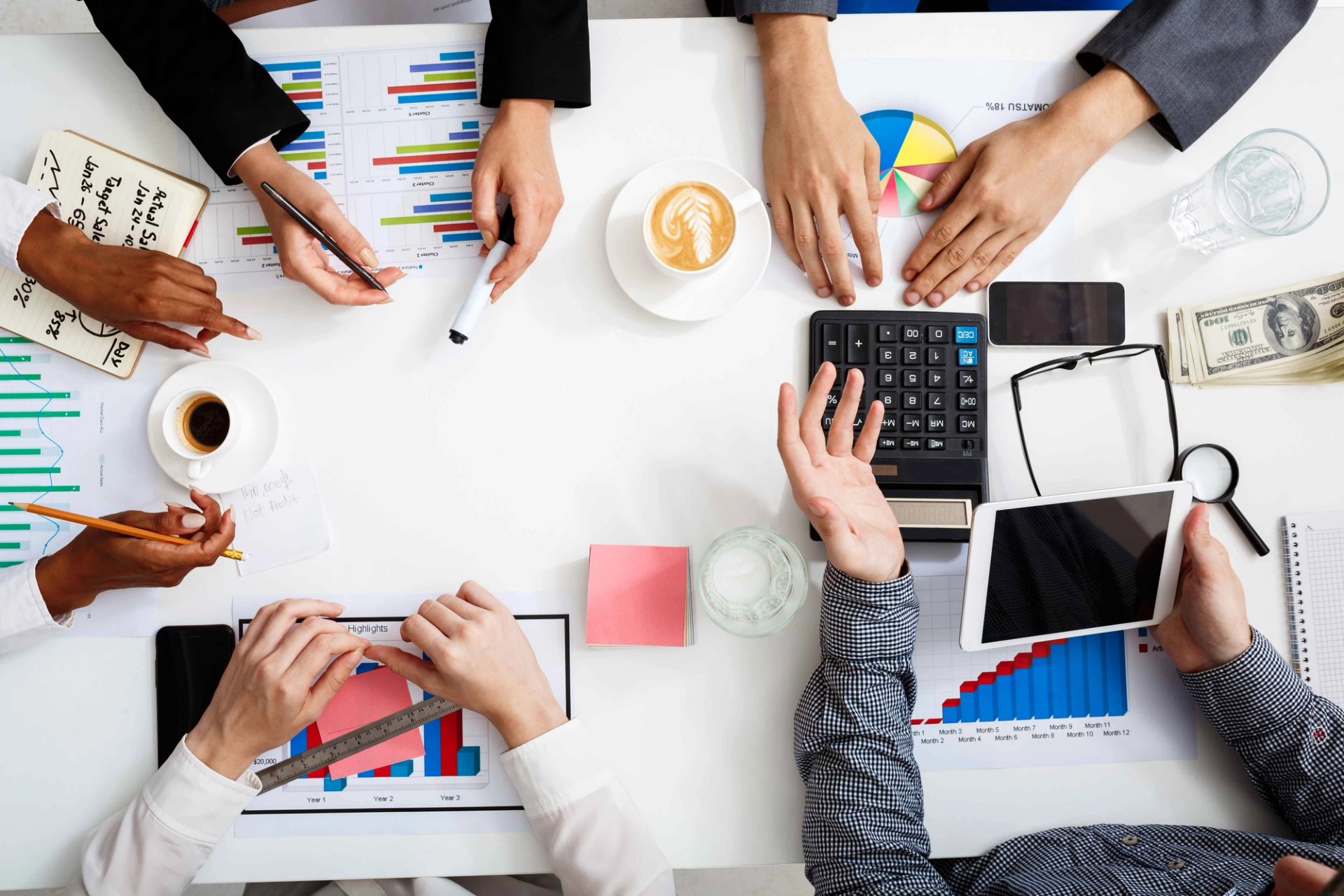 A group of people working in an office setting.