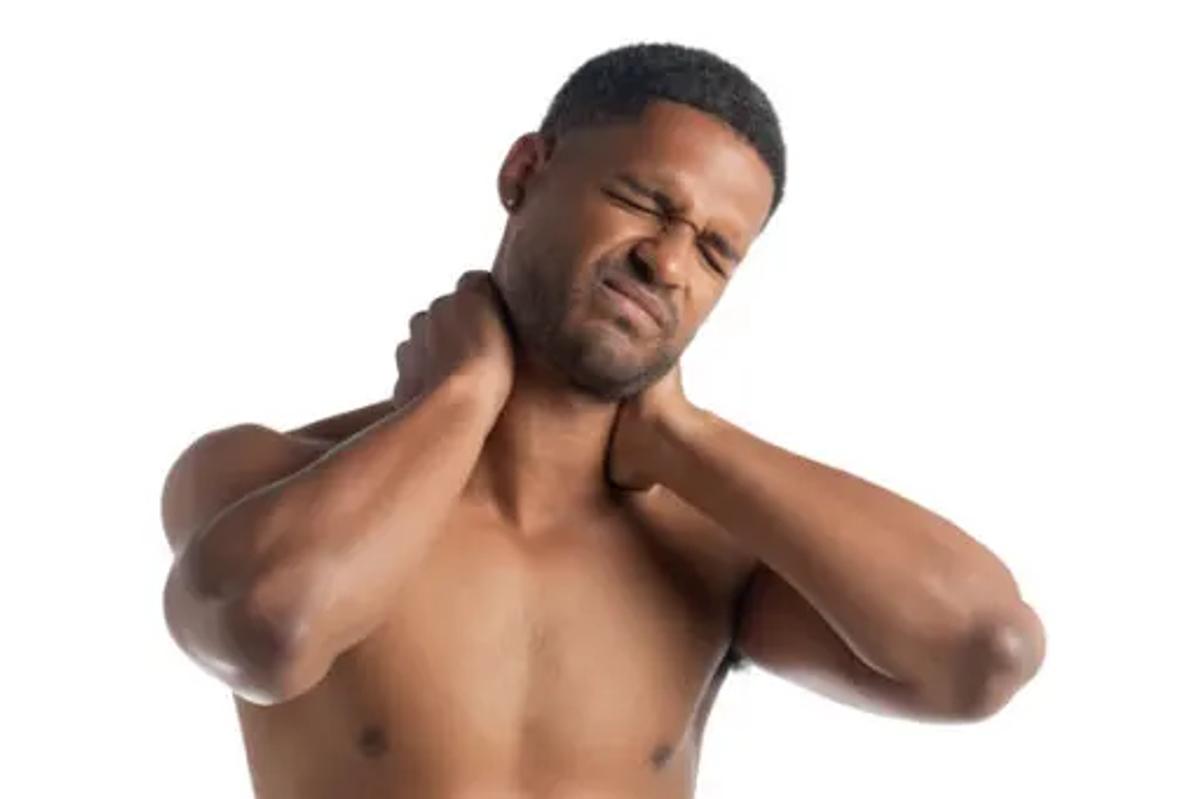 Person with a stiff neck and aching shoulders