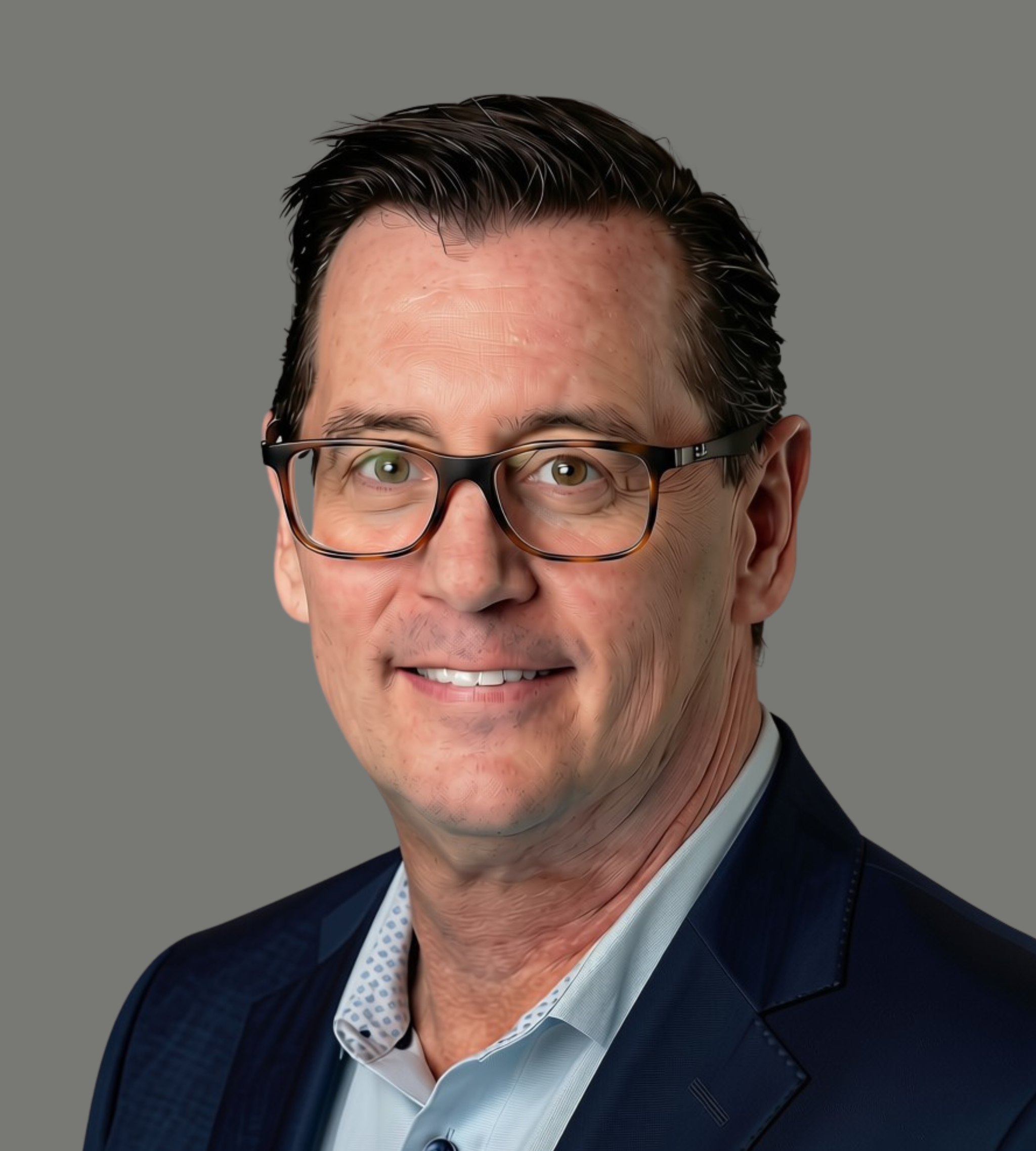 Professional headshot of a smiling man wearing glasses, a navy blazer, and a light blue shirt.