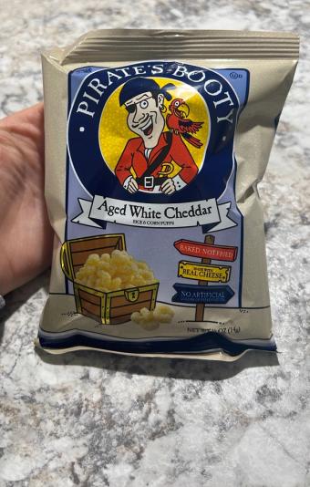 Pirate's Booty, Aged white cheddar rice and corn puffs, barcode: 0015665251230, has 1 potentially harmful, 5 questionable, and
0 added sugar ingredients.