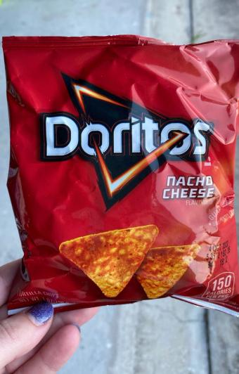 Doritos , Doritos Nacho Cheese Flavored Tortilla Chips 1 Oz, barcode: 0028400090896, has 9 potentially harmful, 7 questionable, and
    2 added sugar ingredients.
