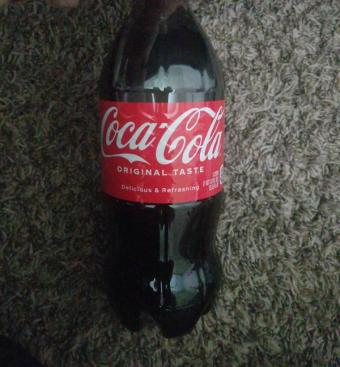 Coca-cola, Coca-Cola Original 1 lt Bottle, barcode: 0049000005226, has 3 potentially harmful, 1 questionable, and
    1 added sugar ingredients.