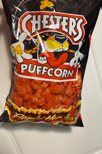 Chesters flamin hot puffcorn, barcode: 0028400705745, has 7 potentially harmful, 5 questionable, and
    1 added sugar ingredients.