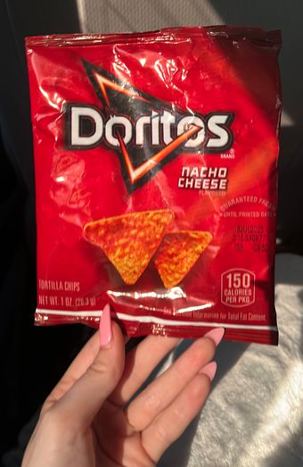 Doritos , Doritos Nacho Cheese Flavored Tortilla Chips 1 Oz, barcode: 0028400090896, has 9 potentially harmful, 7 questionable, and
    2 added sugar ingredients.