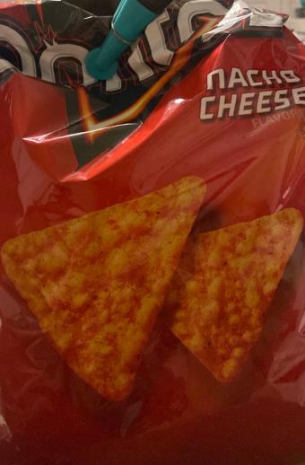 Doritos , Doritos Nacho Cheese Flavored Tortilla Chips 30 oz, barcode: 0028400047456, has 9 potentially harmful, 7 questionable, and
    2 added sugar ingredients.