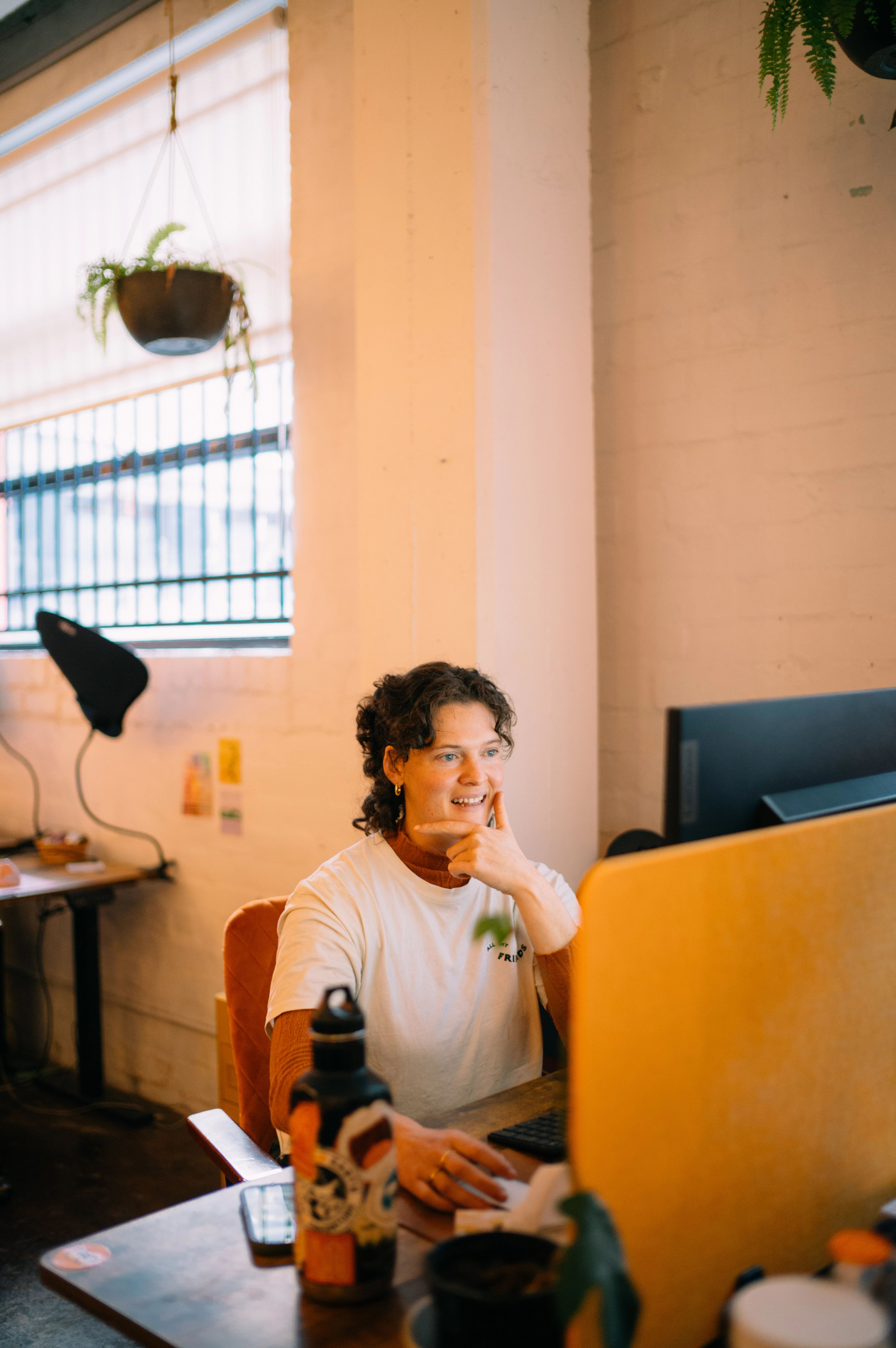 A tenant sitting at her desk working