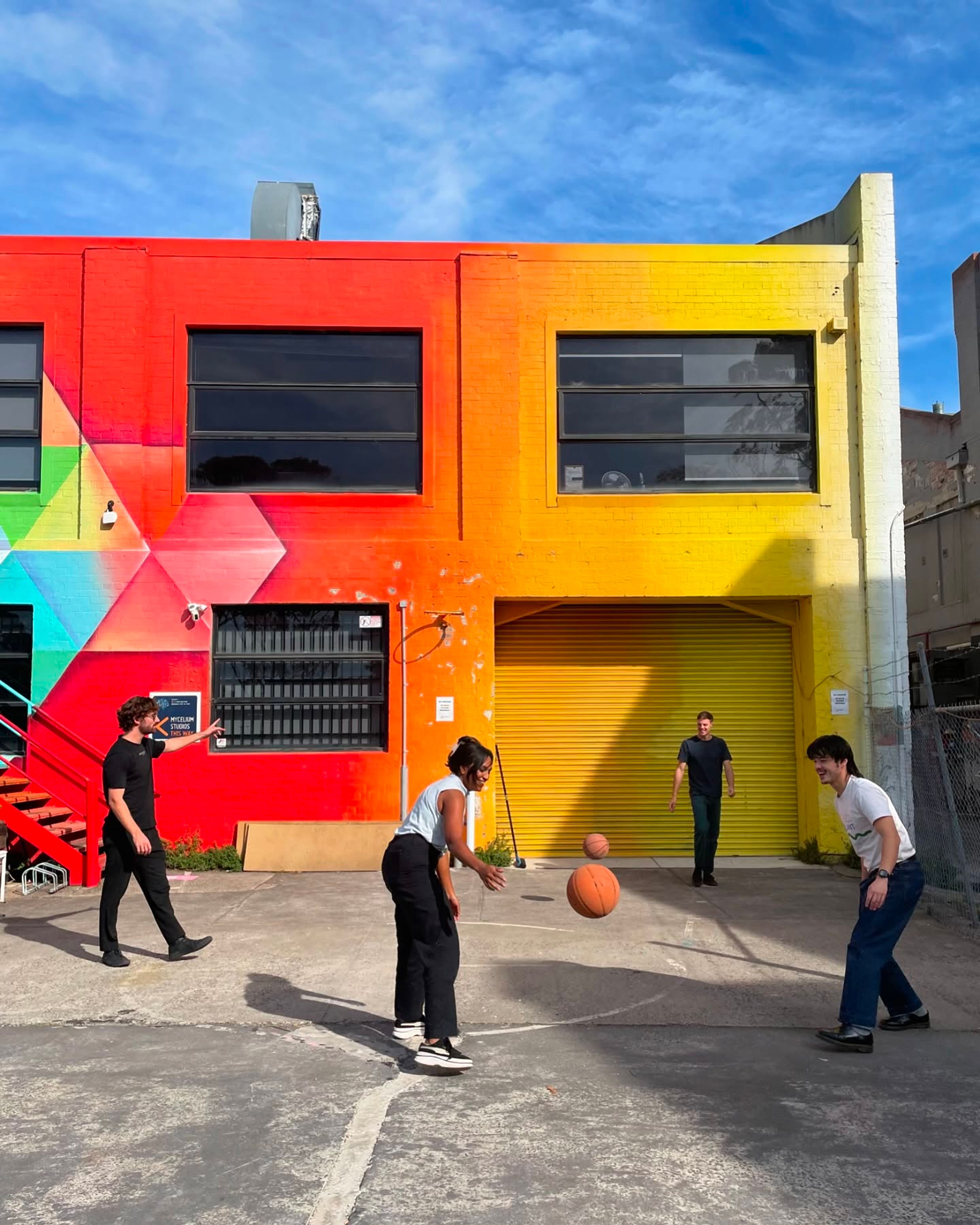 A bunch of Co Paradiso members playing basketball