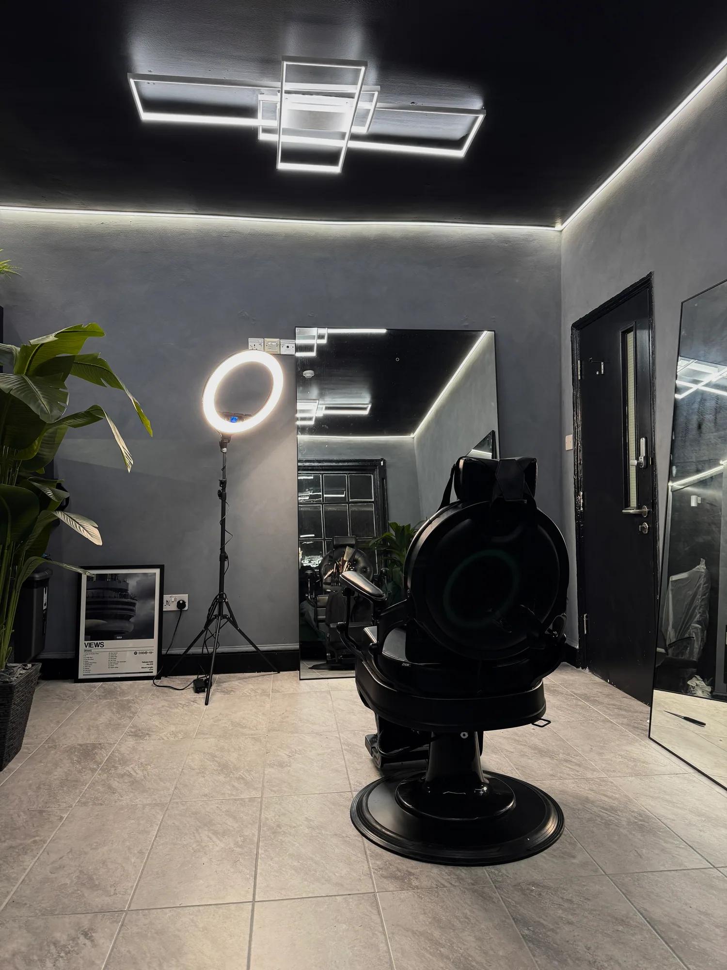 The barber chair and mirror in the Chair and Blade studio