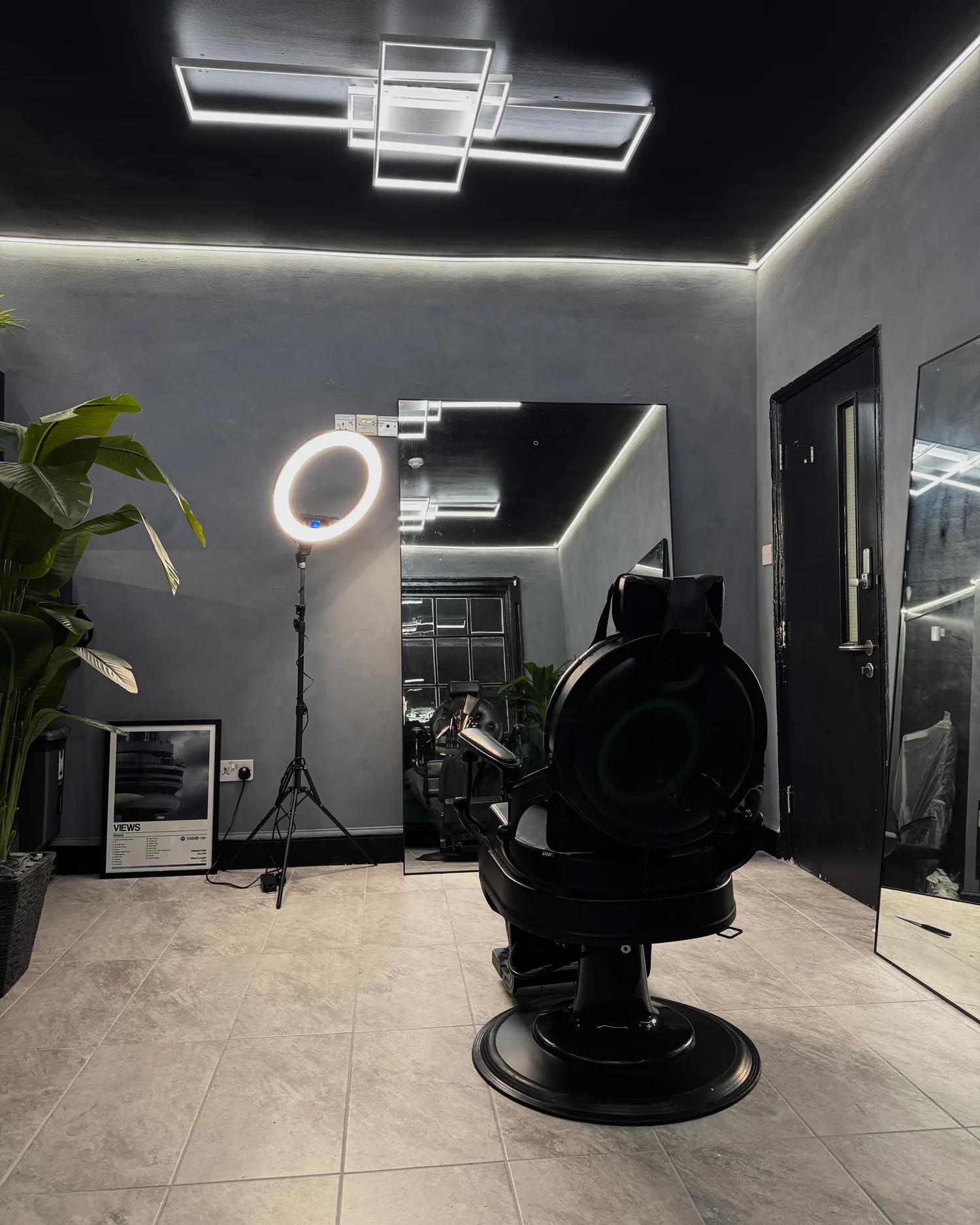 The barber chair and mirror in the Chair and Blade studio