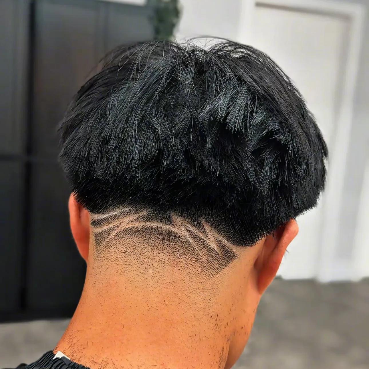 Undercut with a shaved line design, earlier work by Emmanuel (EA Blades)