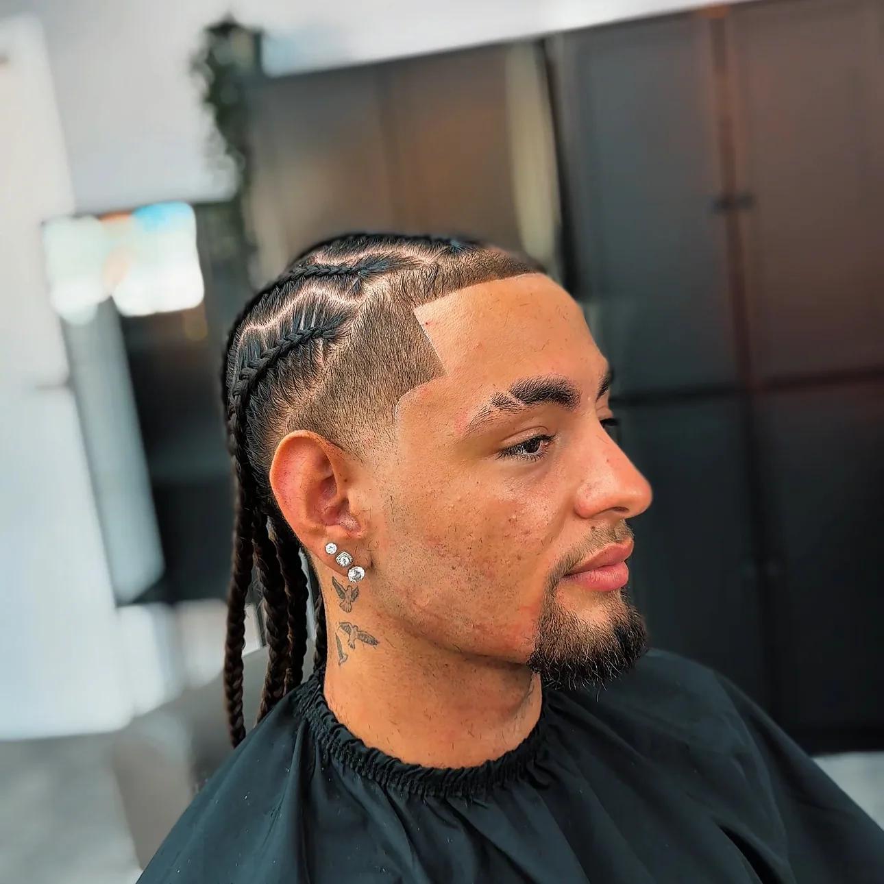 Braids with a skin fade, earlier work by Emmanuel (EA Blades)