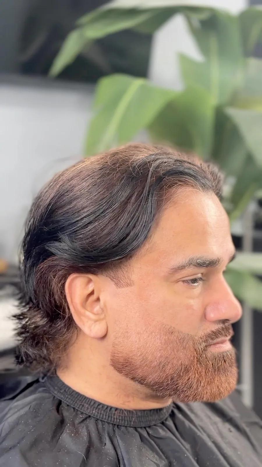 Long scissor cut with a full beard at Chair and Blade