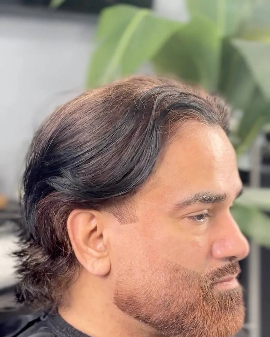 Long scissor cut with a full beard at Chair and Blade