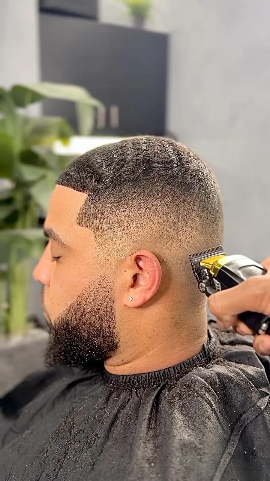 Skin fade with a clean nape line at Chair and Blade